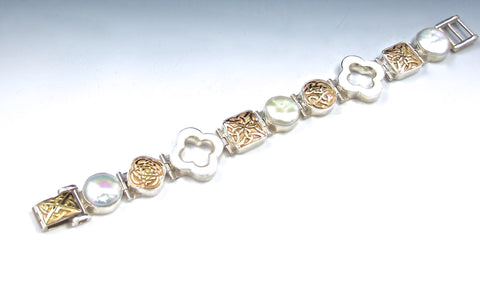 Gold eternity knot bracelet with mother of pearl