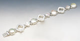 Quatrefoil and white pearl bracelet